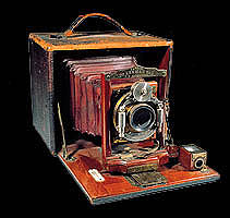 wood and brass antique camera